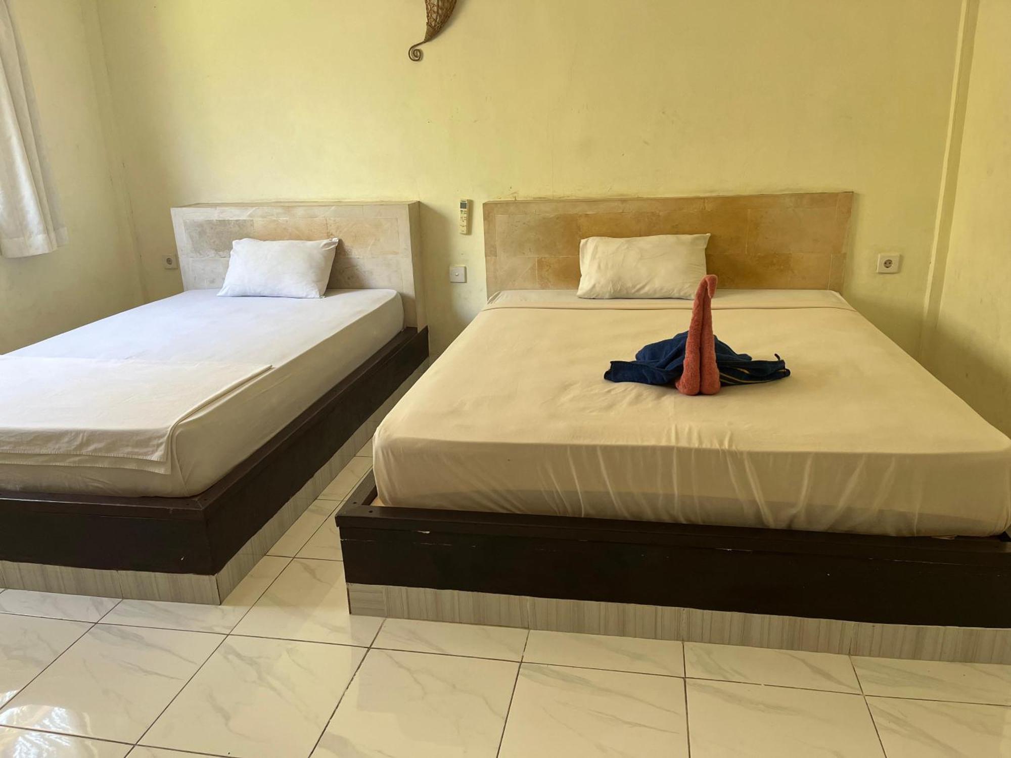 Amed Stop Inn Homestay, Rooftop Restaurant And Bar Exterior photo